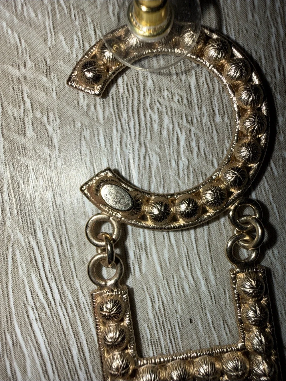 CHANEL Gold Crystal Logo Dangle Earrings